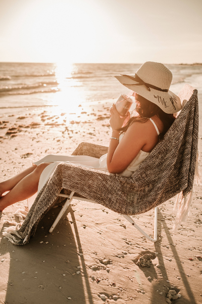 Lady wearing Personalized Mrs. Beach Floppy Hat in Natural